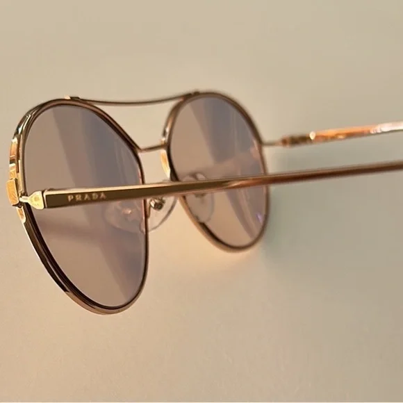 PRADA Rose Gold Round Aviator lightly tint sunglasses indoor  display picture 1
